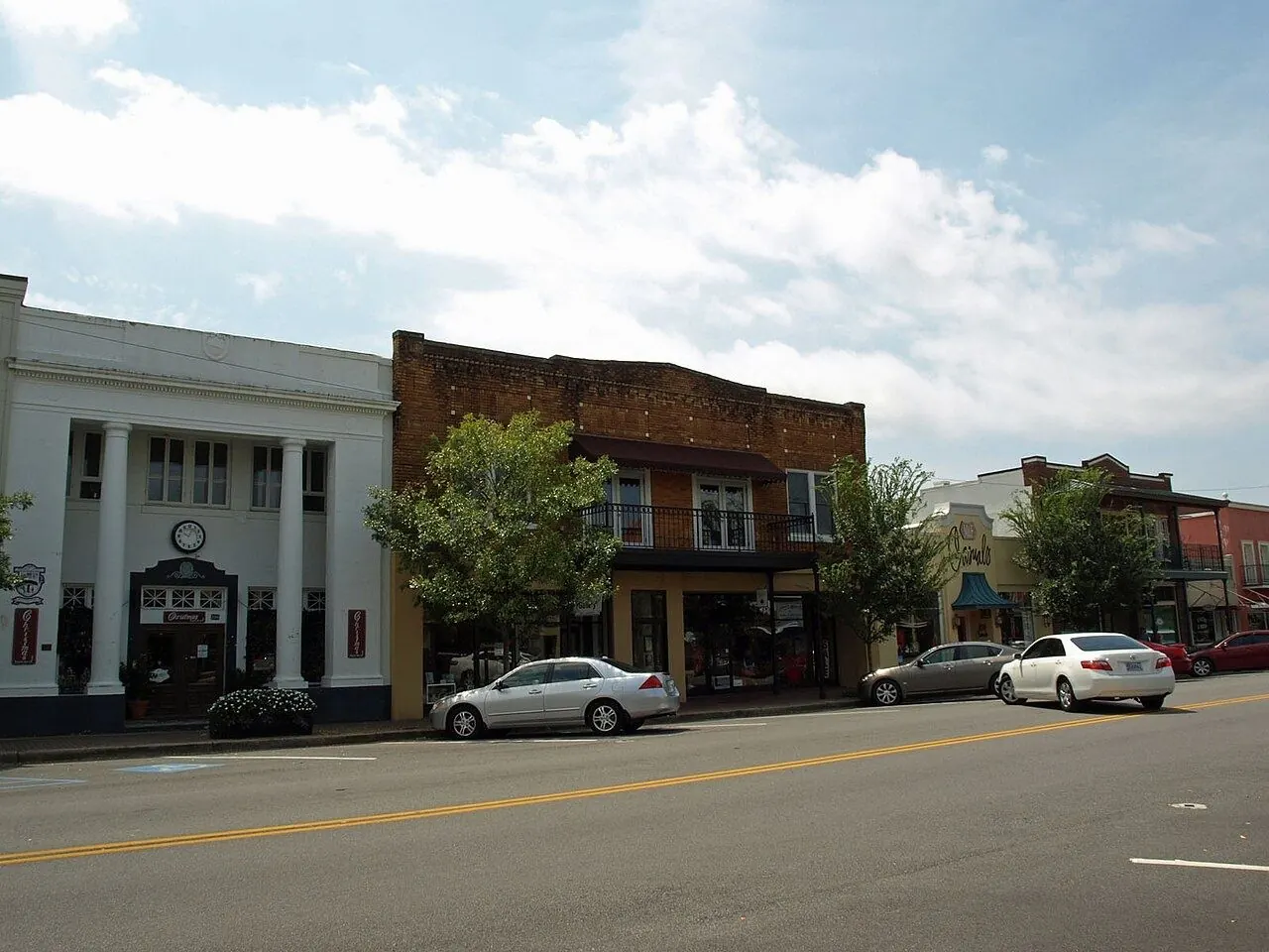 Walkable coastal town street near protected wetlands