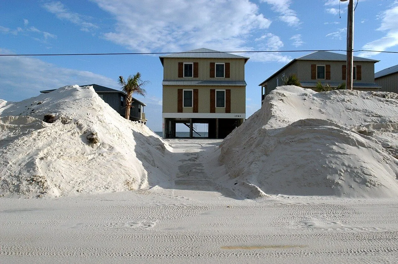Boarded-up windows on a coastal home before a hurricane