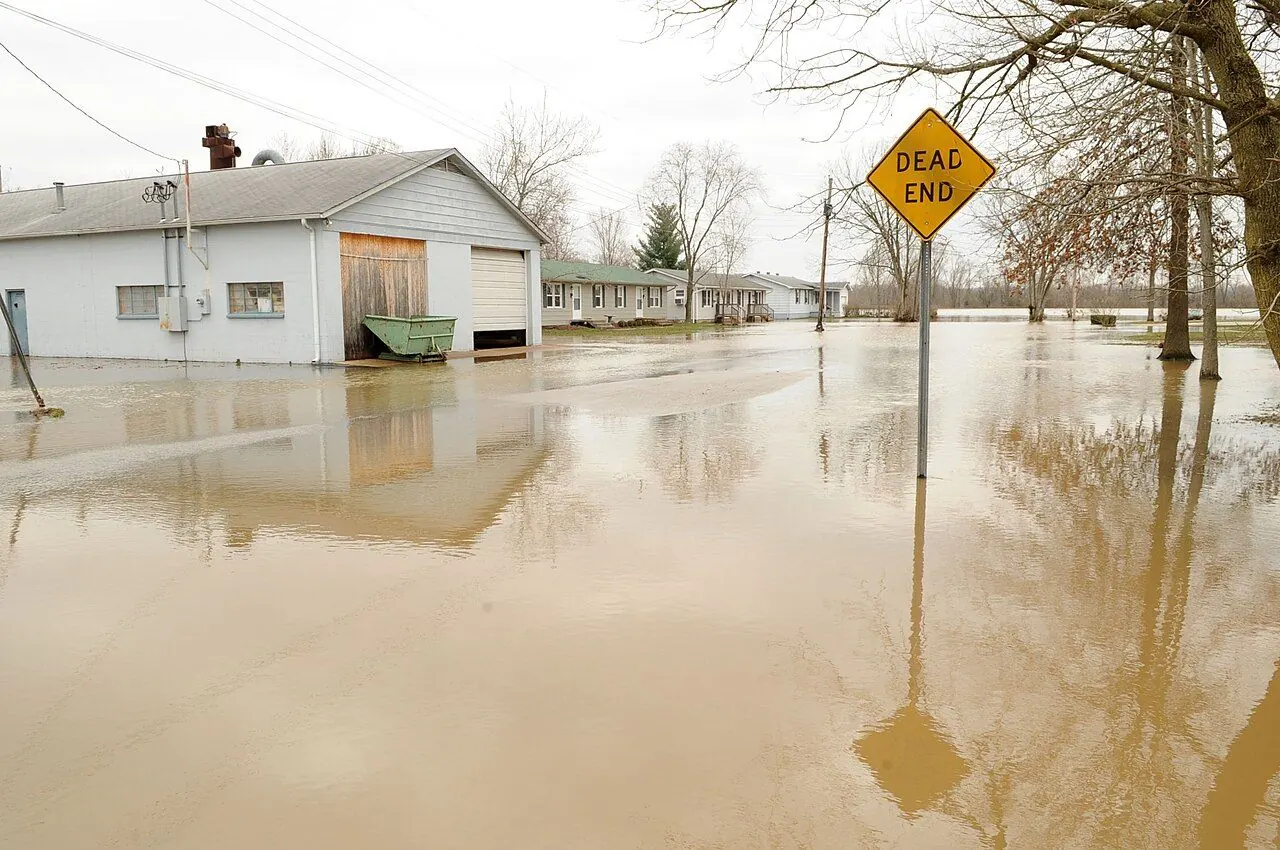 Floodwater surrounding homes in a coastal neighborhood